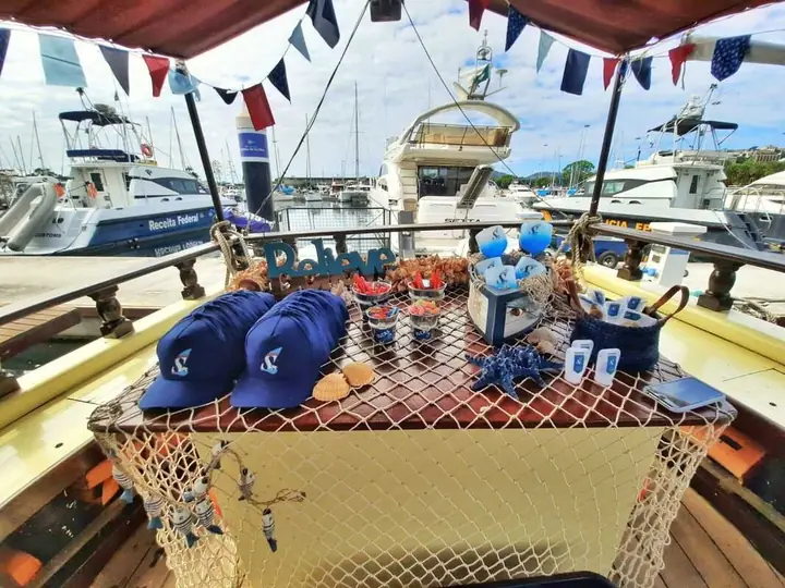 Yacht decorated with bunting and a themed table